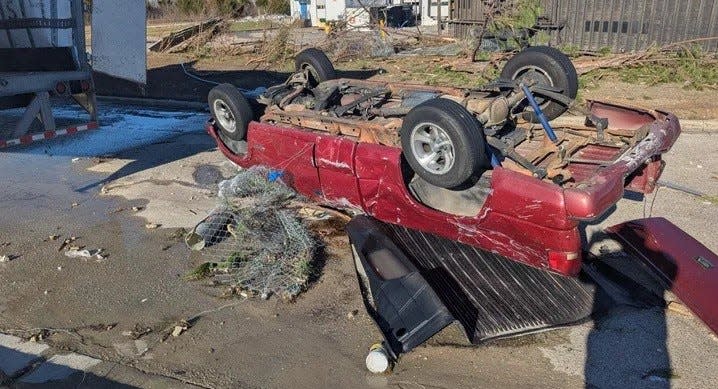 Security services worker Brian Knight survived a weekend tornado in Montgomery but his truck was heavily damaged.