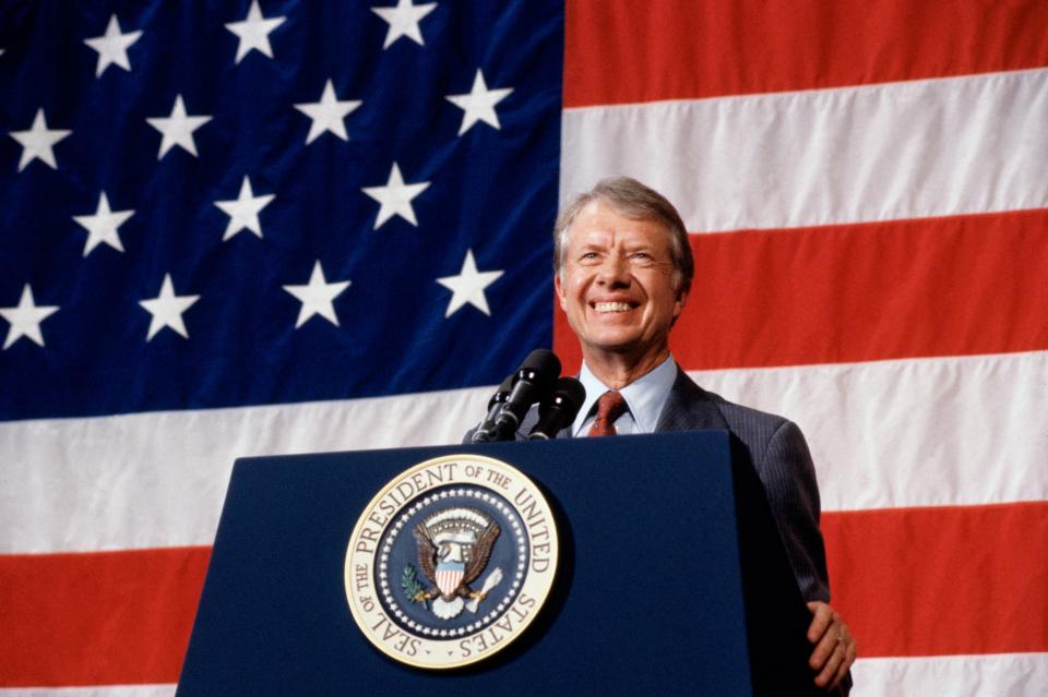 President Jimmy Carter addressing a town meeting. / Bettmann / Contributor / Getty Images