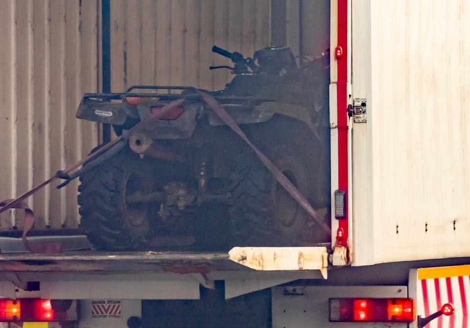 The Honda quad bike being removed from the scene (PA)