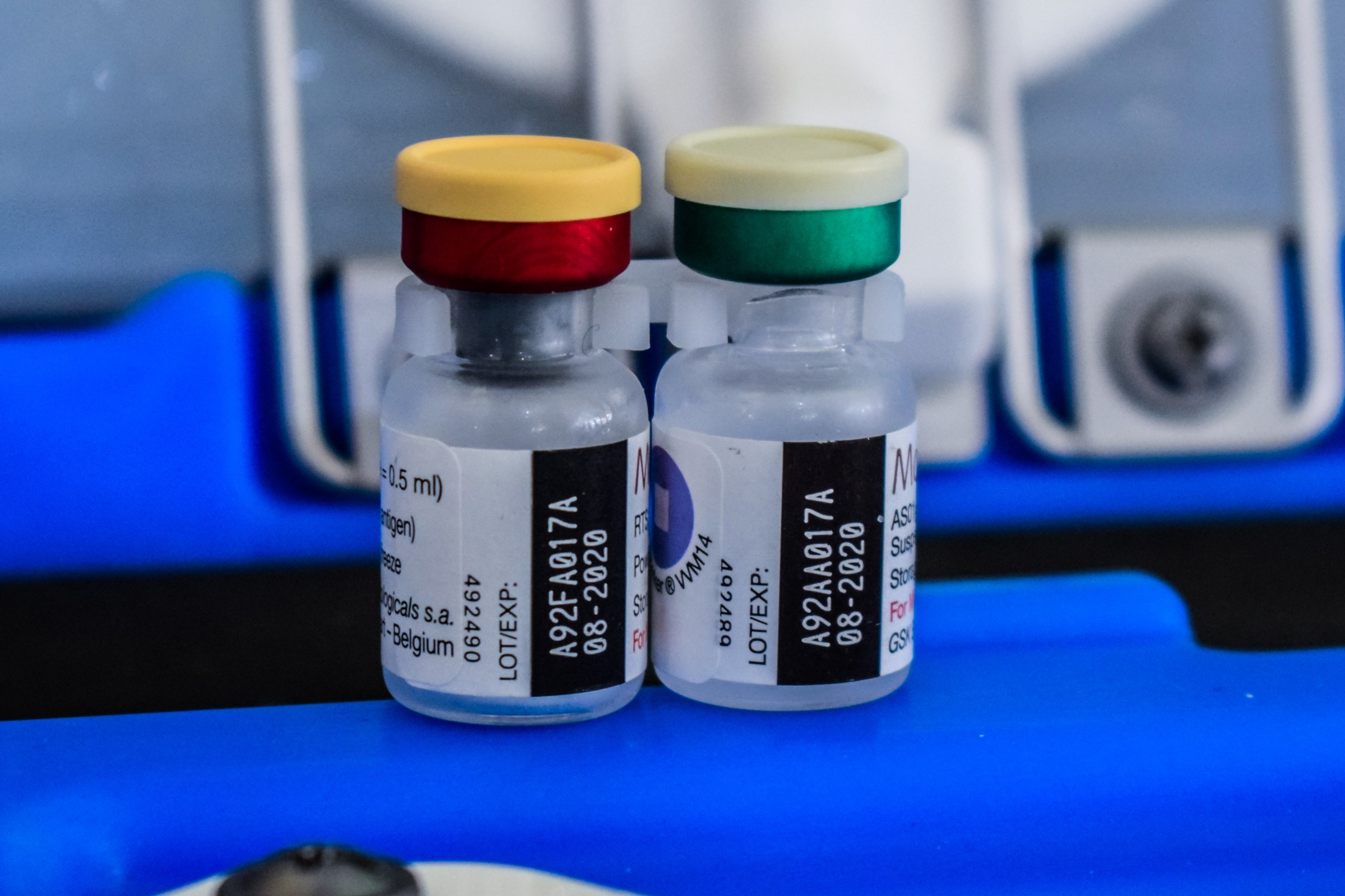 Two malaria vaccine vials.