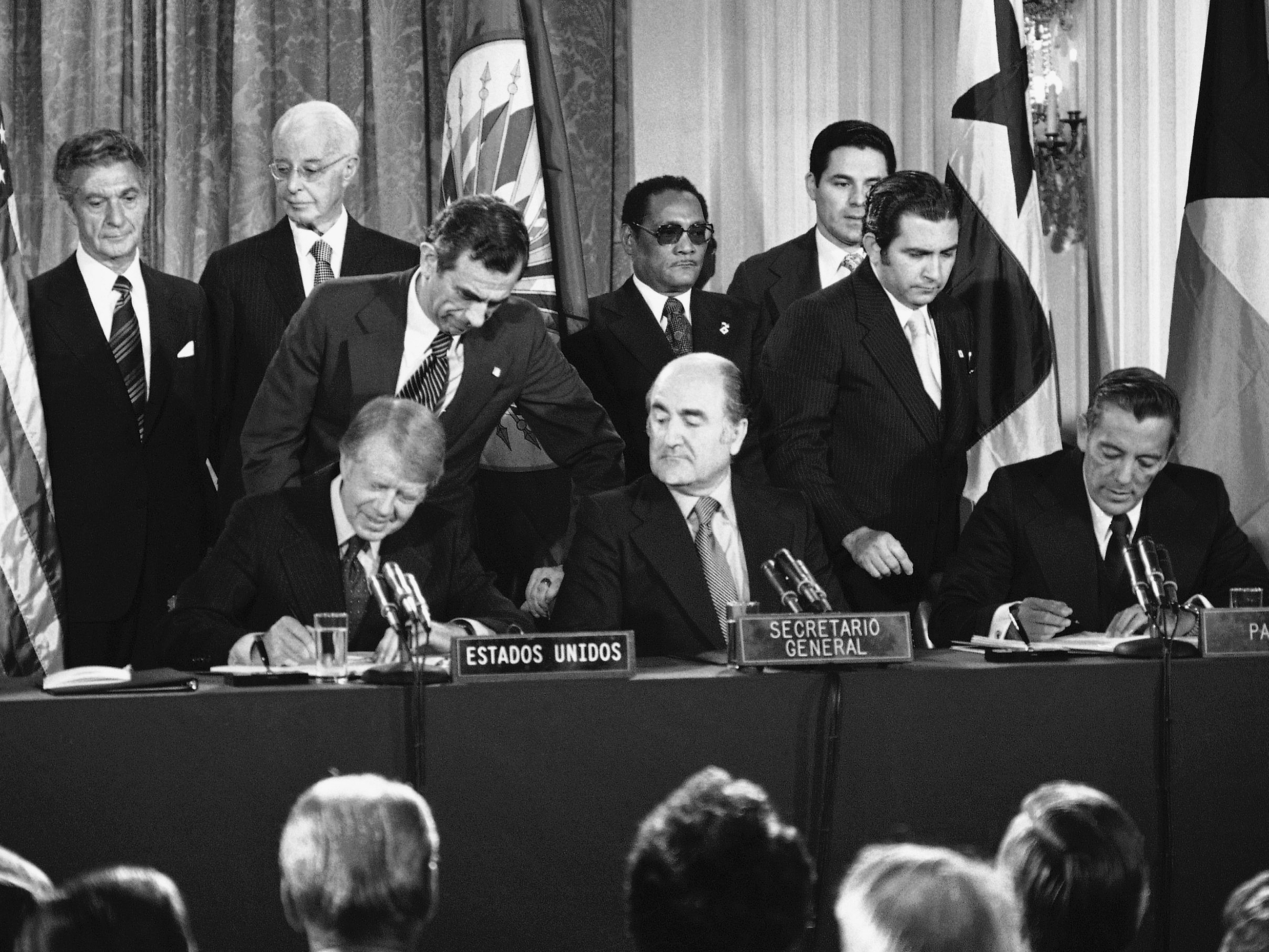 Officials sign the Panama Canal treaties Sept. 7, 1977, at the Pan American Union in Washington, D.C. From left: President Jimmy Carter; Organization of American States Secretary-General Alejandro Orfila; and Panama&#039;s head of government Omar Torrijos.