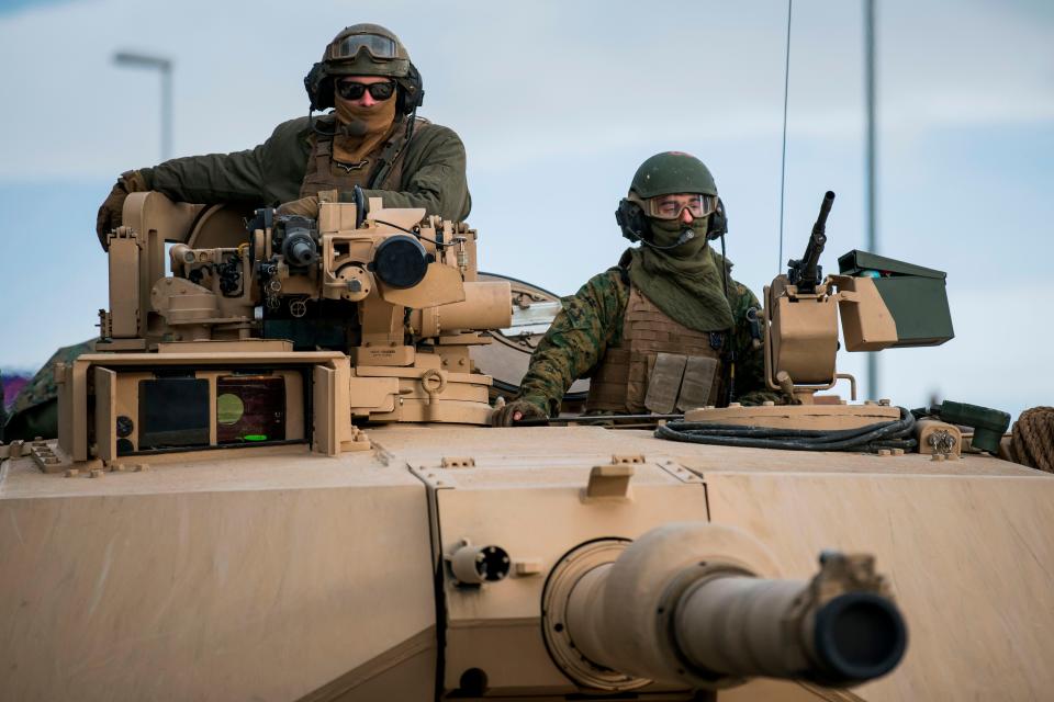 US Marines prepare their M1 Abrams tank to take part in an exercise to capture an airfield as part of the Trident Juncture 2018, a NATO-led military exercise, on November 1, 2018, near the town of Oppdal, Norway.