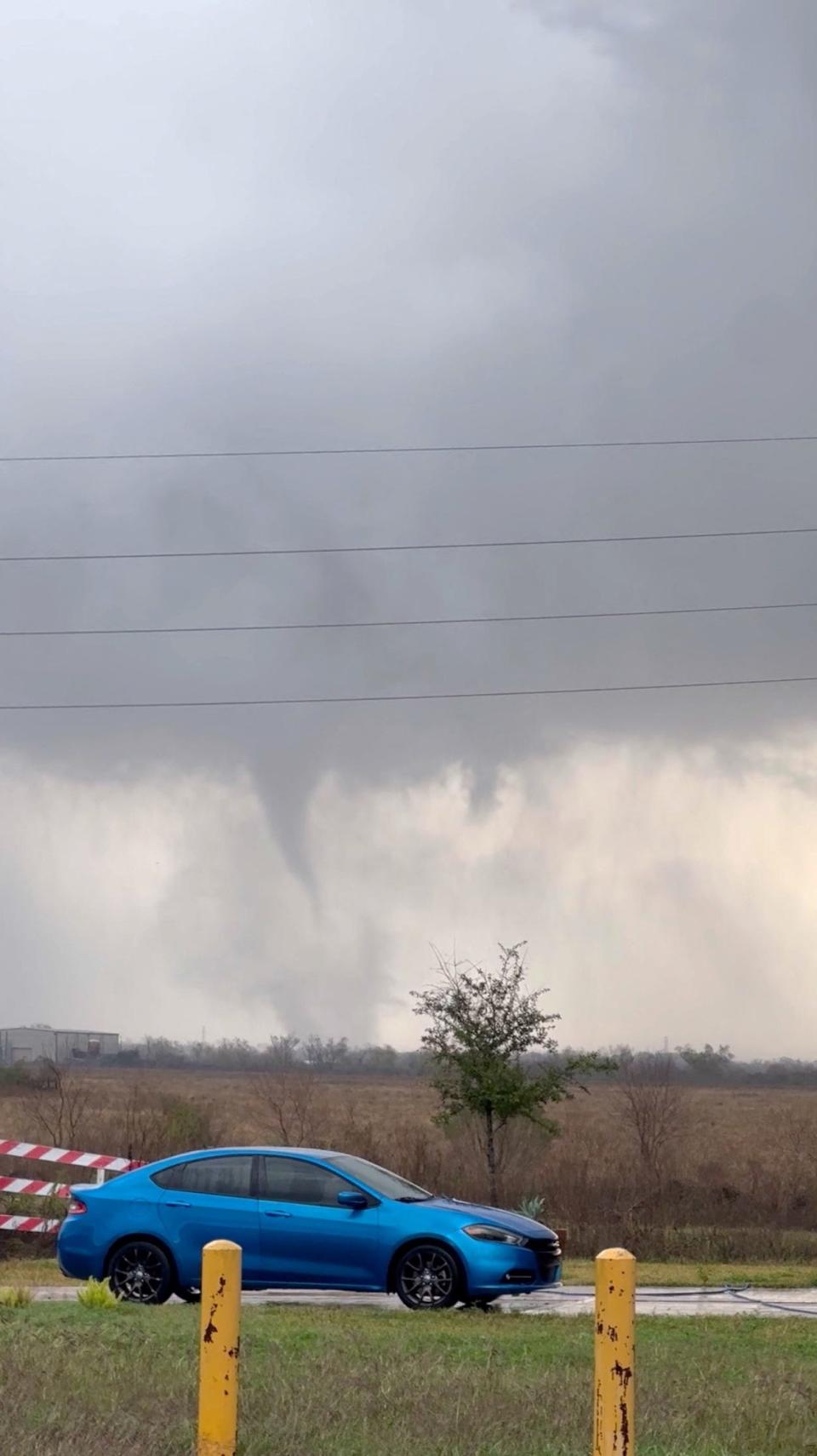 A tornado crosses a field in Katy, Texas, on Dec. 28, 2024, in this screengrab obtained from a social media video.