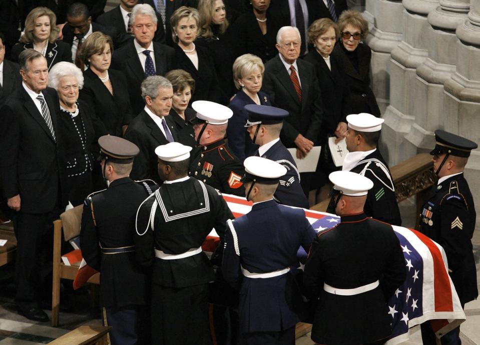 A military honor guard carries the casket of former President Gerald Ford during a funeral service on 2 January, 2007 in Washigton DC (Getty Images)