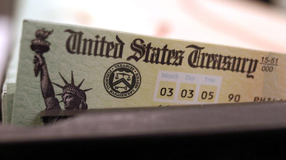 <div>FILE - Blank Social Security checks are run through a printer at the U.S. Treasury printing facility Feb. 11, 2005, in Philadelphia, Pennsylvania. (Photo by William Thomas Cain/Getty Images)</div>