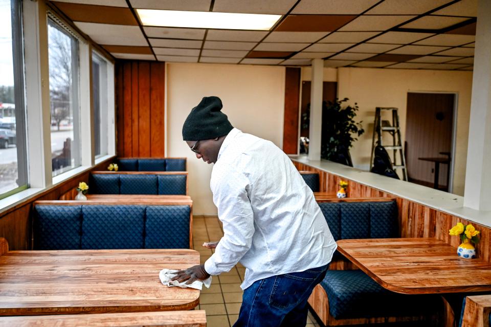 Mikal Moore works inside Carrie's Kitchen on Monday, Jan. 29, 2024, in Lansing. The restaurant closed three months later.