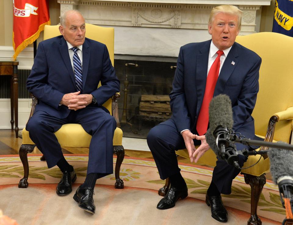 Then-President Donald Trump and White House chief of staff John Kelly in 2017. Kelly, a retired four-star Marine general, now says Trump “certainly falls into the general definition of fascists.”