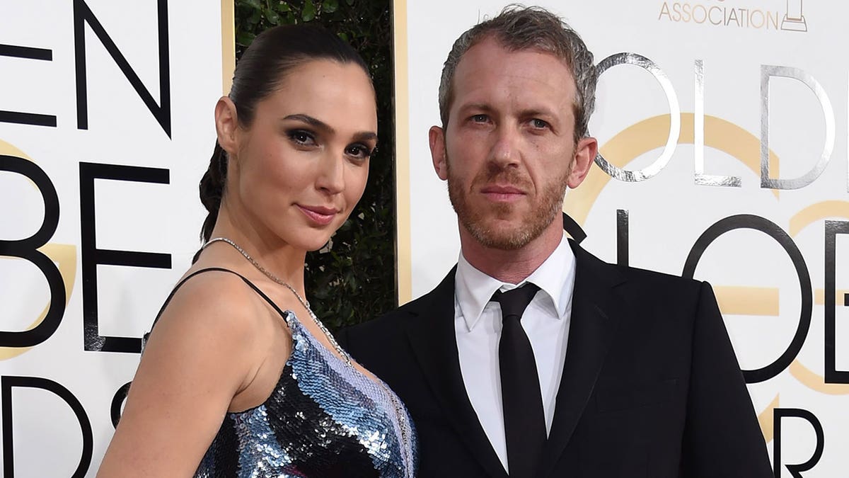 Gal Gadot sparkles in silver dress at Golden Globes with husband