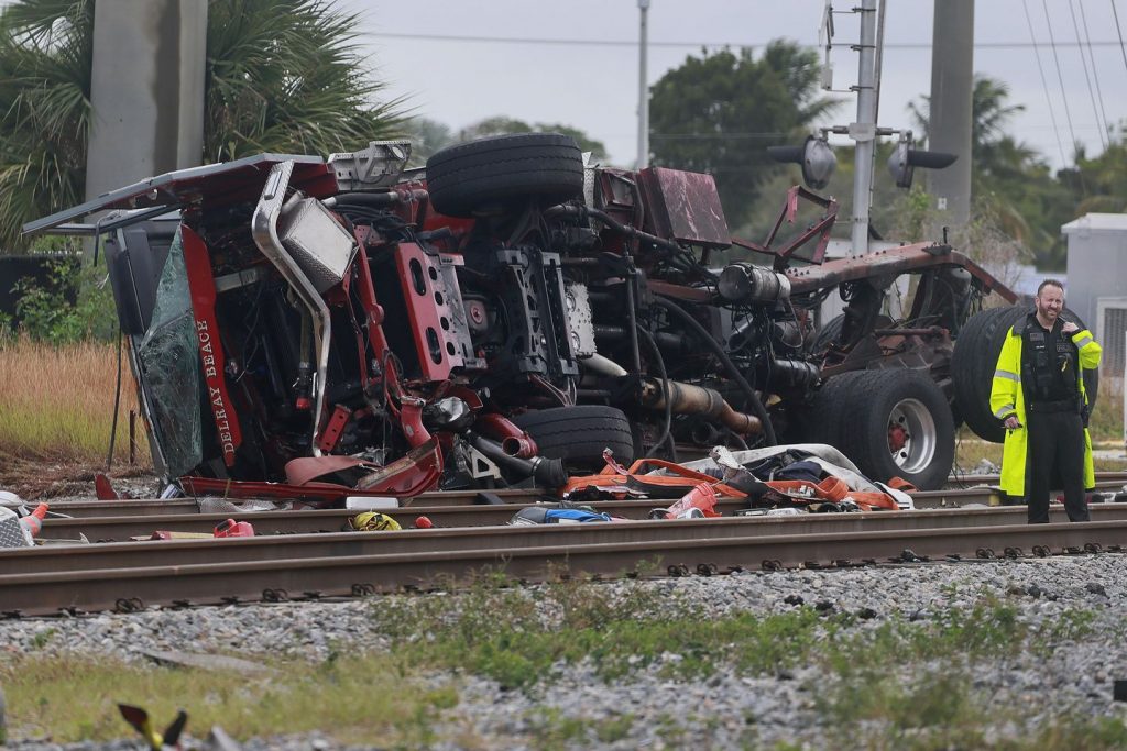 Train collides with fire truck in Florida, 3 firefighters and at least 12 passengers hurt