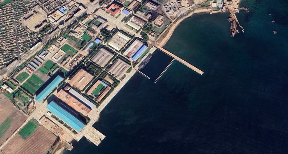 A satellite image of the Pongdae Submarine Factory on the northeast coast of North Korea, the center of its submarine development activities. <em>Google Earth</em>