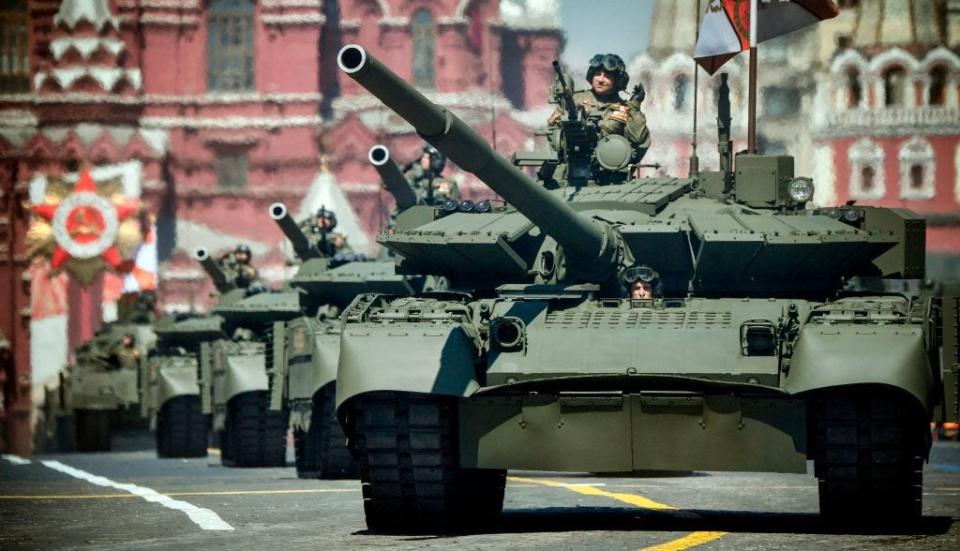 Russian T-72B3 tanks move through Red Square during a military parade, which marks the 75th anniversary of the Soviet victory over Nazi Germany in World War Two, in Moscow on June 24, 2020.