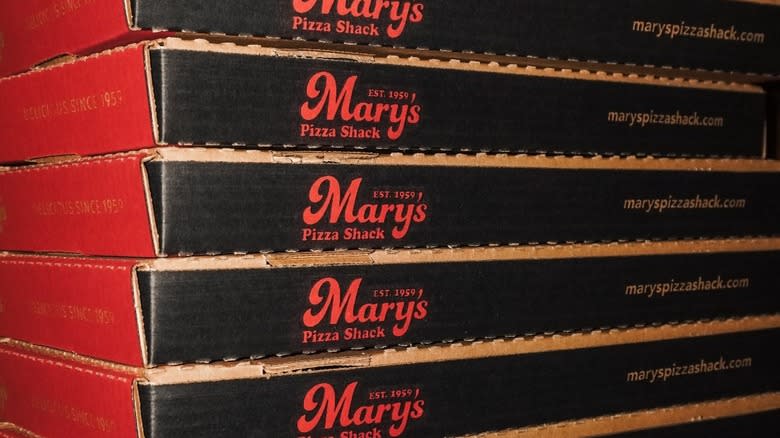 Stack of Mary&#39;s Pizza Shack pizza boxes