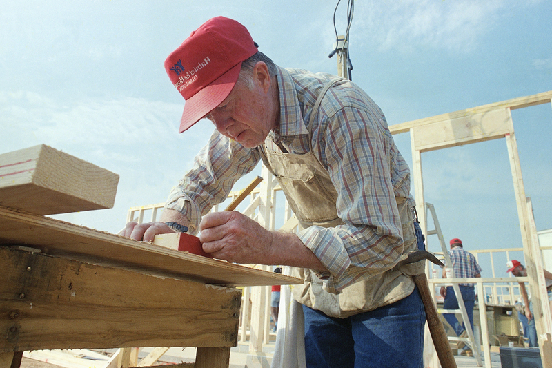 Former President Jimmy Carter works on a Habitat for Humanity project in Charlotte, N.C., in July 1987.