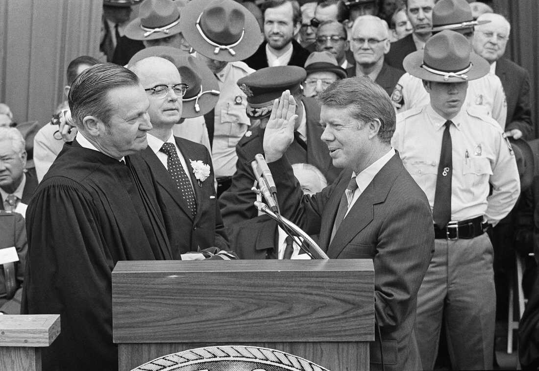 Judge Robert H. Jordan administers the oath of office to incoming Gov. Jimmy Carter at the Georgia State Capitol in Atlanta on Jan. 12, 1971.