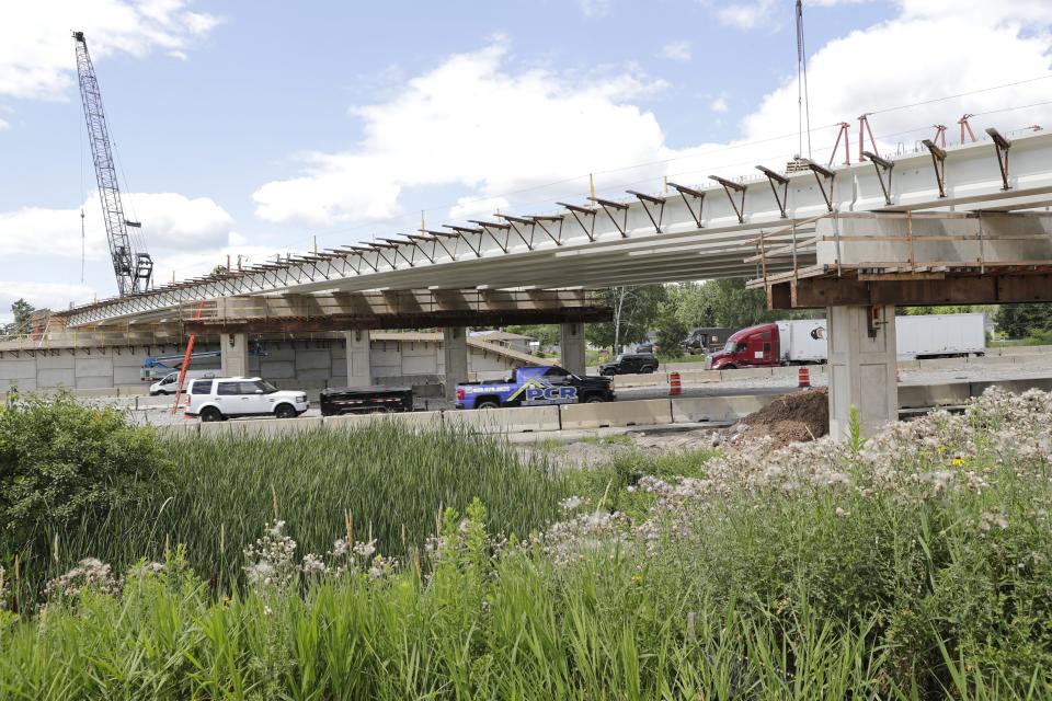 Traffic passes under the new Capitol Drive overpass that is under construction along Interstate 41 Thursday, July 18, 2024, in Appleton, Wisconsin.