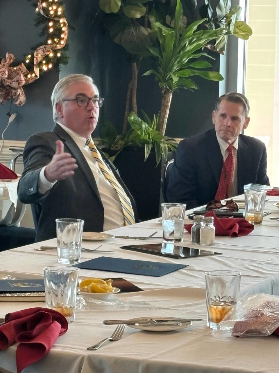 Mississippi state Sen. Mike Thompson, left, and Pass Christian Jimmy Rafferty participate in a meeting at the Pass Christian Yacht Club about Mississippi River flooding. Lieutenant governors from Mississippi and Louisiana, along with other public officials from Mississippi, attended the meeting.