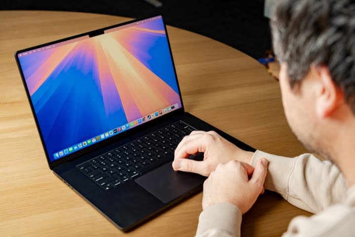 Someone using a MacBook Pro M4.