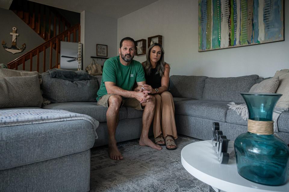 Inaldo Dasilva and Doralice Ferreira in a portrait in their townhome that they've rented for eight years on July 2, 2024, in unincorporated Palm Beach County, Fla. The couple and their daughter have a month to find a new place to live after their landlord informed them that the property would be offered for sale.