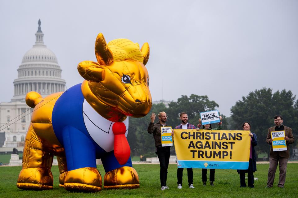 Protesters against former President Donald Trump rally on the National Mall on Oct. 2, 2024, in Washington, D.C.