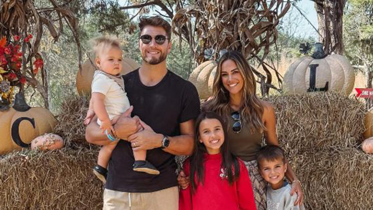 Jana Kramer and Allan Russell with her two kids and their 1-year-old son