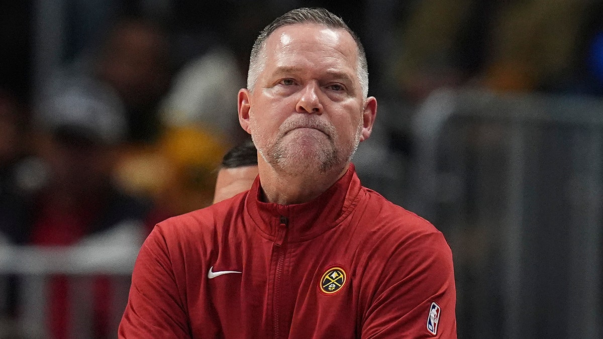 Michael Malone coaches