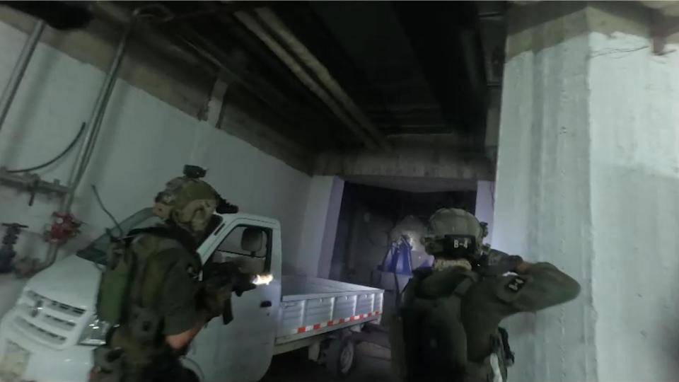 IAF commandos in one of the tunnels at the facility during the raid. <em>IDF</em>