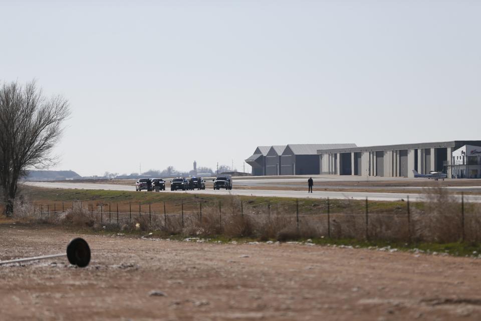 Emergency personnel respond to a plane crash that injured two people Friday at Lubbock Executive Airpark.