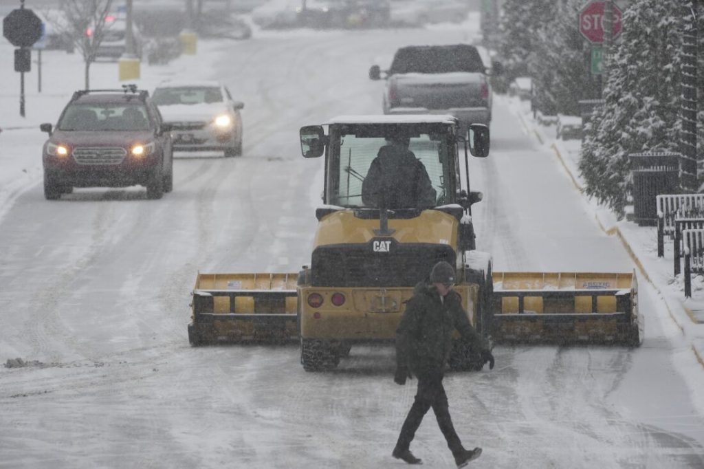 Snowstorms close schools, offices across a large part of the U.S. : NPR