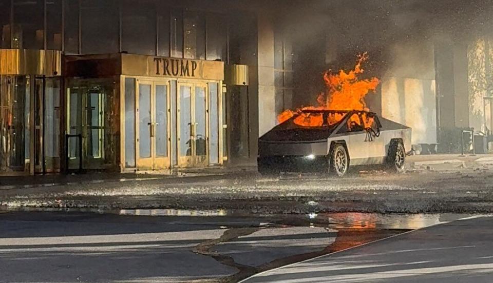 Flames rise from a Tesla Cybertruck after it exploded outside the Trump International Hotel Las Vegas, in Las Vegas, Nevada, U.S., January 1, 2025. / Alcides Antunes via REUTERS
