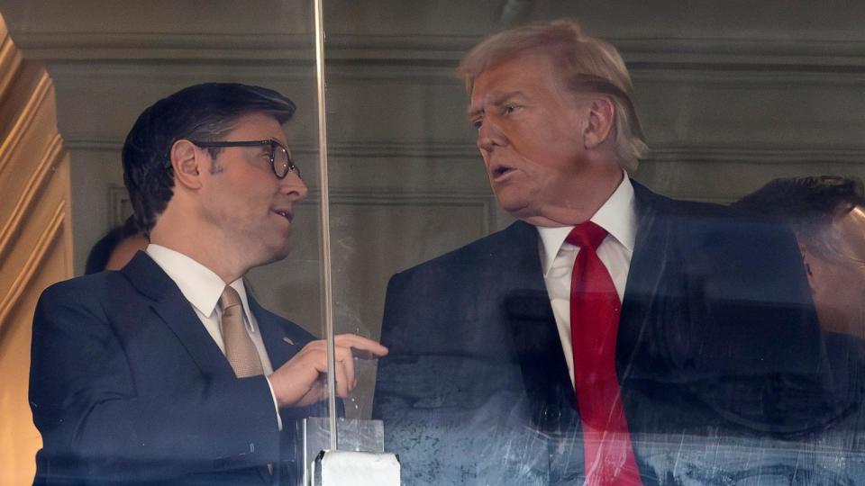 PHOTO: Speaker of the House Mike Johnson talks to President-elect Donald Trump as they attend the 125th Army-Navy football game Dec. 14, 2024, in Landover, Maryland.  (Kevin Dietsch/Getty Images)