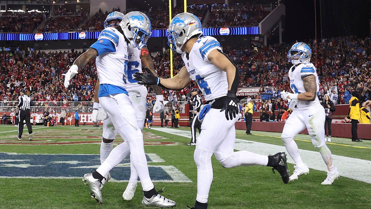 Jameson Williams celebrates