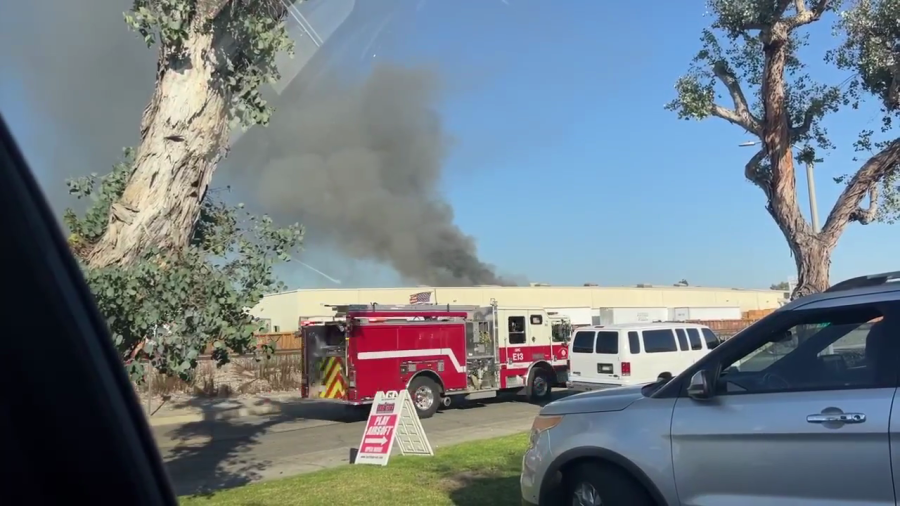 Video posted to the Citizen App shows smoke billowing from the site of a plane crash in Fullerton on Jan. 2, 2025. (Citizen App)