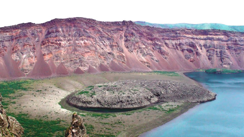 The 1831 eruption occurred at Zavaritskii volcano on Simushir Island. The explosion generated a 1.87-mile-wide caldera, revealing red, black and white layers made up of past eruptive deposits. - Oleg Dirksen