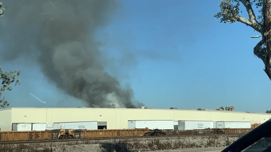 Video posted to the Citizen App shows smoke billowing from the site of a plane crash in Fullerton on Jan. 2, 2025. (Citizen App)