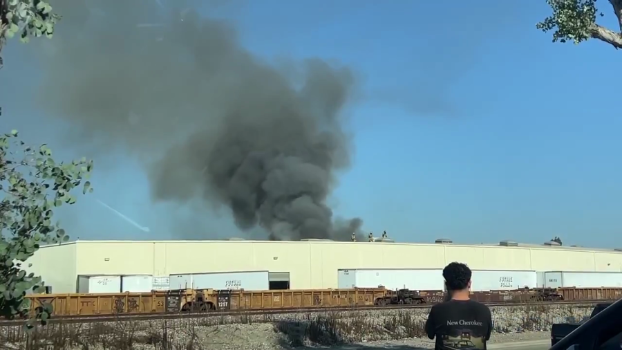 Video posted to the Citizen App shows smoke billowing from the site of a plane crash in Fullerton on Jan. 2, 2025. (Citizen App)