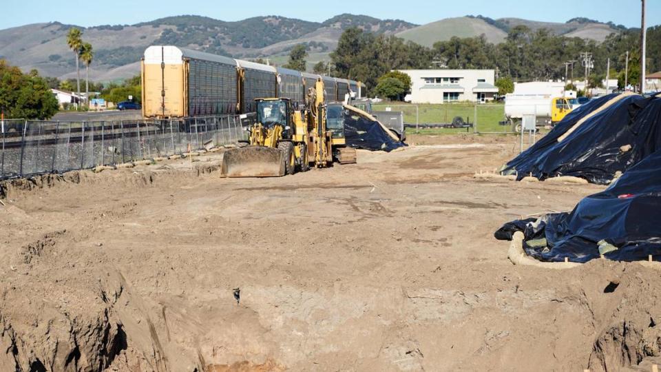 Construction work on a new mixed-use condominium and commercial space development at the former site of B.J.&#x002019;s ATV Rentals at 197 West Grand Ave. in Grover Beach unearthed an oily substance that residents nearby could smell, pictured Tuesday, Dec. 31, 2024. Grover Beach community development director Megan Martin said the contaminated soil was expected in the building process, and will be removed by Friday, Jan. 10, 2025.