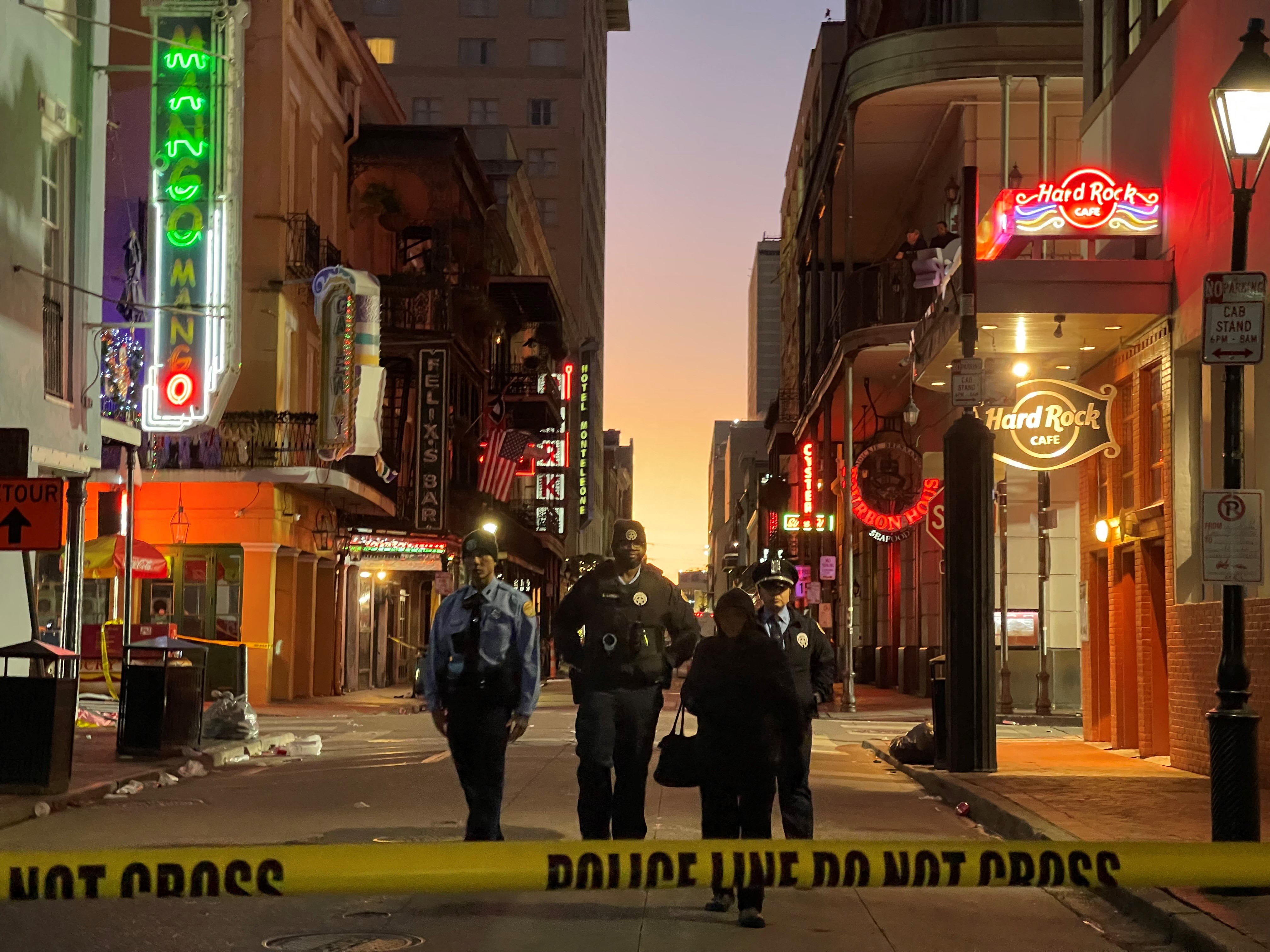 Police cordon off the area around the site of the overnight attack in the French Quarter of New Orleans, Louisiana, on January 1, 2025. At least 10 people were killed and 30 injured Wednesday when a vehicle plowed overnight into a New year's crowd in the heart of the thriving New Orleans tourist district, authorities in the southern US city said. (Photo by Matthew HINTON / AFP) (Photo by MATTHEW HINTON/AFP via Getty Images)