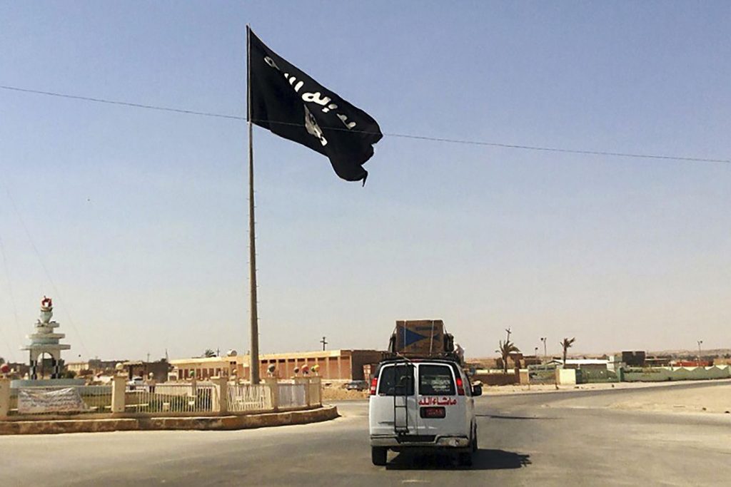 What is the Islamic State group, and what attacks has it inspired by offshoots and lone wolves?