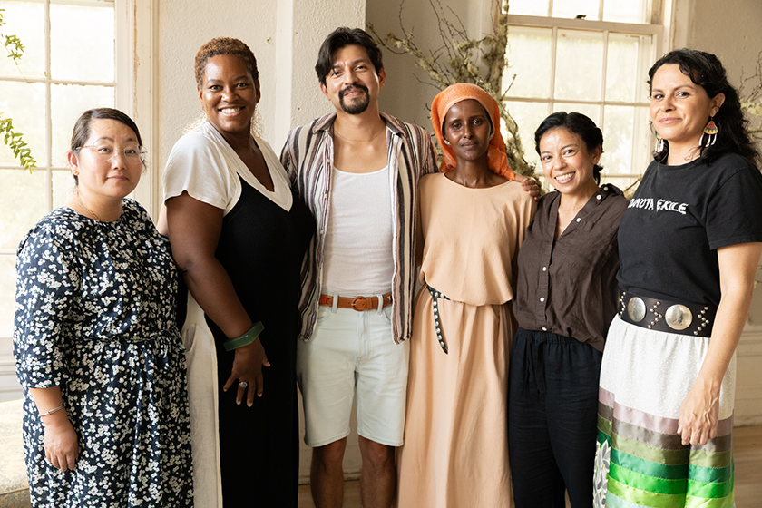 Potluck attendees included, from left: Kao Kalia Yang, Eyenga Bokamba, José Luis, Ifrah Mansour, Mary Prescott and Kate Beane.