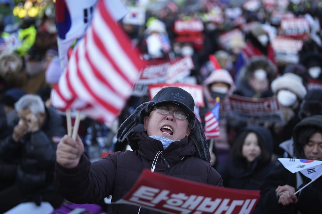 South Korea's impeached president defies warrant after hourslong standoff
