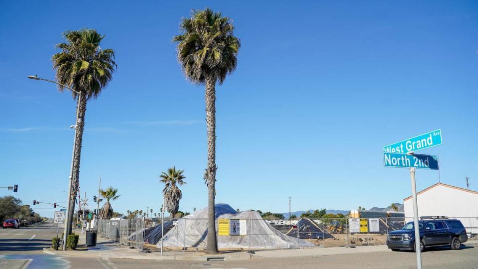 Construction work on a new mixed-use condominium and commercial space development at the former site of B.J.&#x002019;s ATV Rentals at 197 West Grand Ave. in Grover Beach unearthed an oily substance that residents nearby could smell, pictured Tuesday, Dec. 31, 2024. Grover Beach community development director Megan Martin said the contaminated soil was expected in the building process, and will be removed by Friday, Jan. 10, 2025.