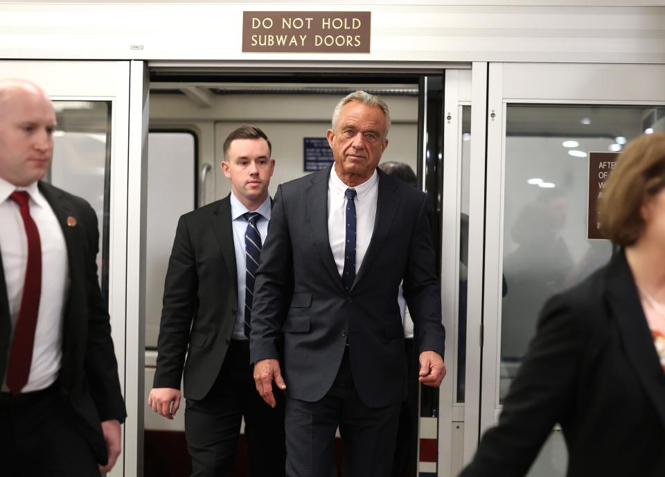 Robert F. Kennedy Jr., President-elect Donald Trump's nominee to lead the Department of Health and Human Services, arrives for meetings at the U.S. Capitol on Dec. 19, 2024.