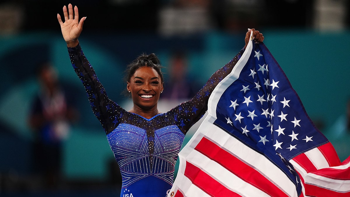 Simone Biles celebrates