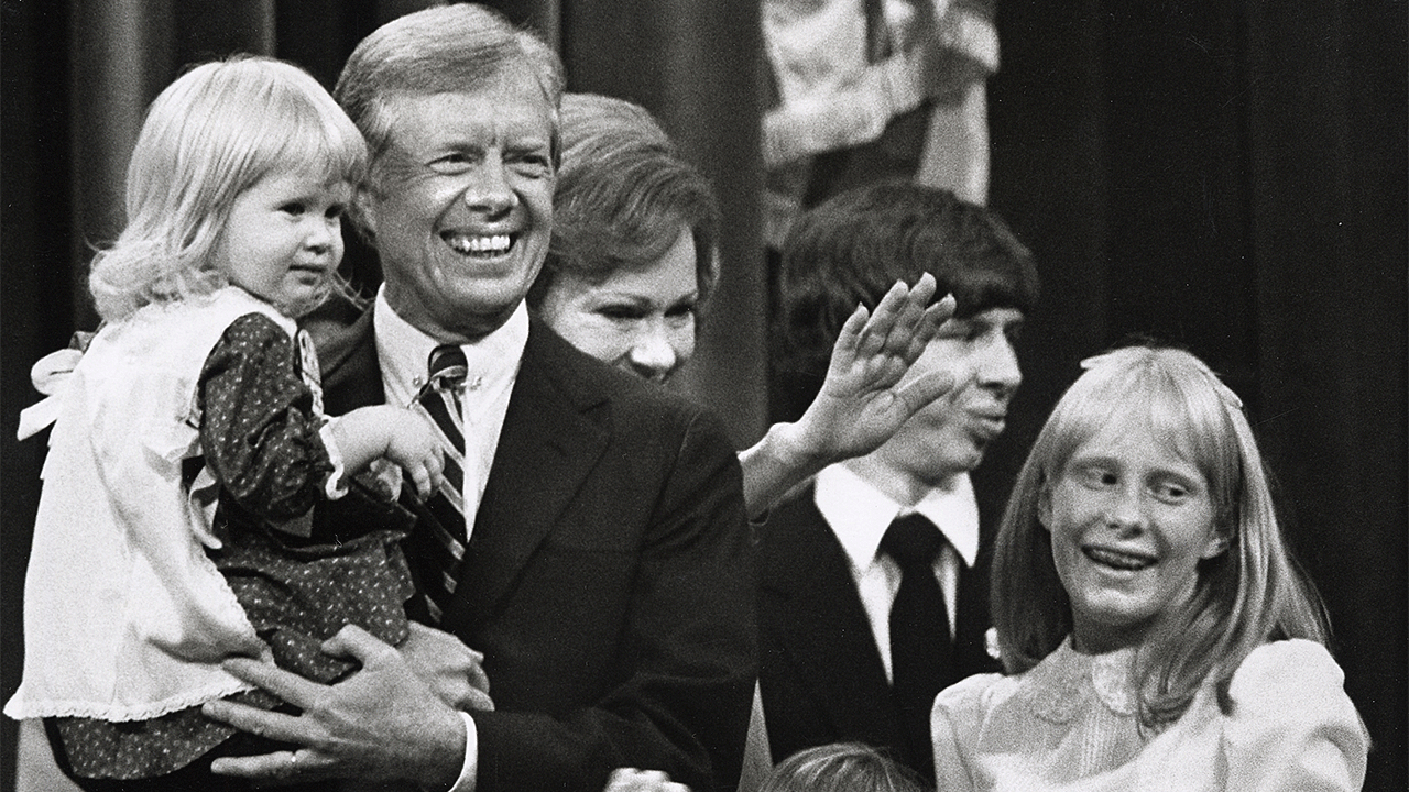 Jimmy Carter and family on stage in 1980 at the DNC