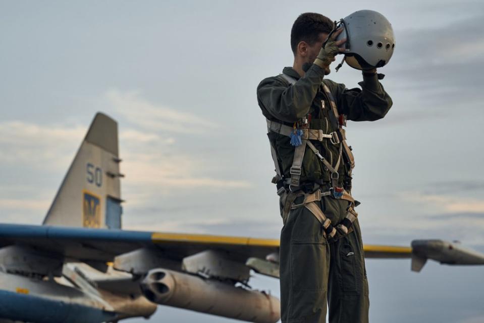 A Ukrainian Su-25 pilot prepares for a combat sortie in eastern Ukraine on August 1, 2023. <em>Photo by Libkos/Getty Images</em> A Ukrainian Su-25 pilot prepares for a combat flight on August 1, 2023, in eastern Ukraine. <em>Photo by Libkos/Getty Images</em>