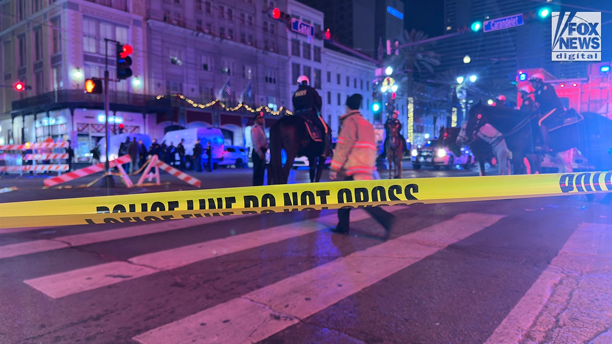 Police investigate a crime scene on Bourbon Street in New Orleans, Louisiana