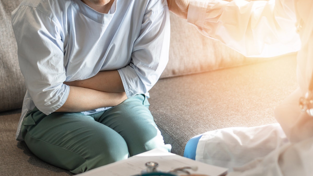 Woman feeling sick