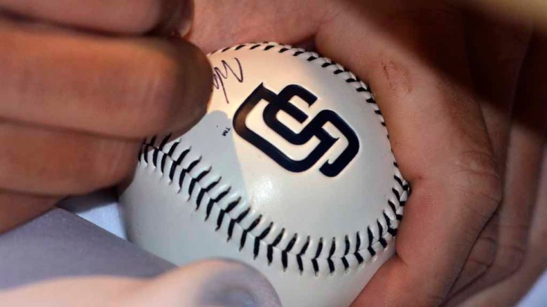 Machado hits tying homer in 8th inning and Padres come back to beat Marlins 4-3 in 11