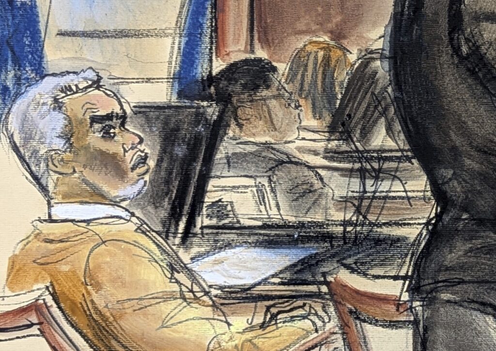 Sean 'Diddy' Combs looks on as defense attorney Nicole Westmoreland cross-examines Dawn Richard during Combs's sex-trafficking and racketeering trial in Manhattan federal court, May 19, 2025.