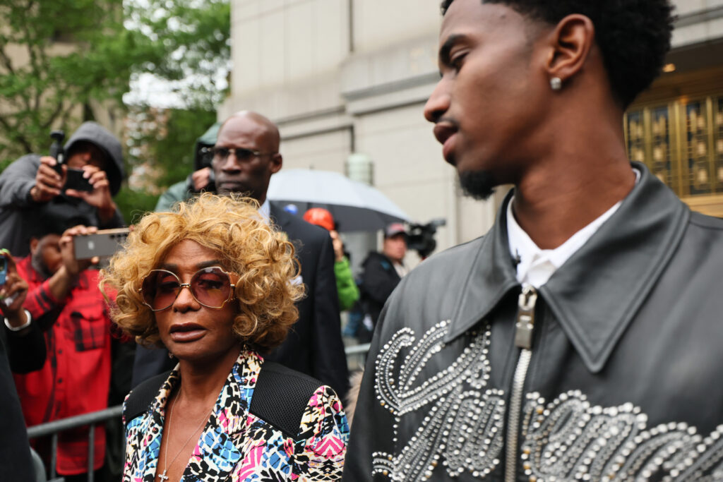 Sean 'Diddy' Combs's mother, Janice Combs, and son, King Combs, leave for the day during Combs's trial at Manhattan federal court on May 13, 2025.